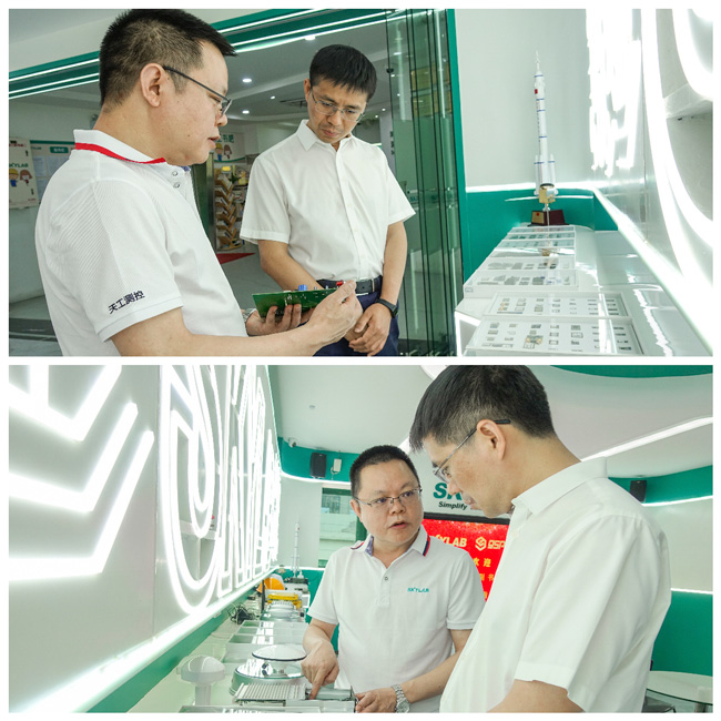 热烈欢迎哈尔滨市香坊区委副书记、区长黄晓伟一行赴天工测控走访调研.jpg 热烈欢迎哈尔滨市香坊区委副书记、区长黄晓伟一行赴天工测控走访调研.jpg